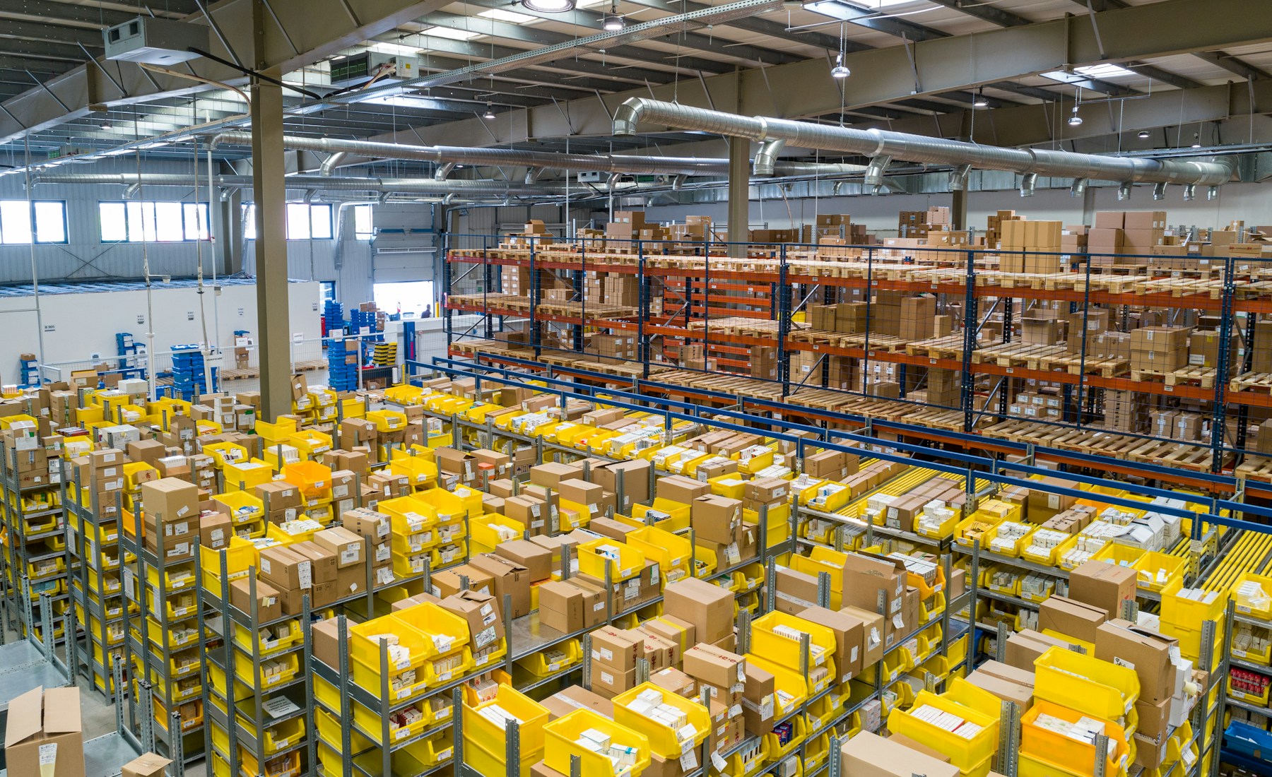 Automotive parts fulfillment warehouse with organized stock ready for dispatch